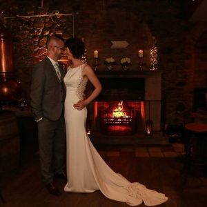 Bride and Groom at Fireplace